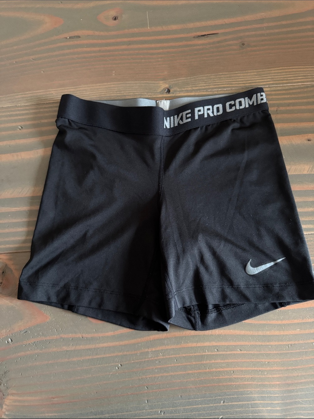 Nike Black Women's Compression Bike Shorts with Silver Swoosh